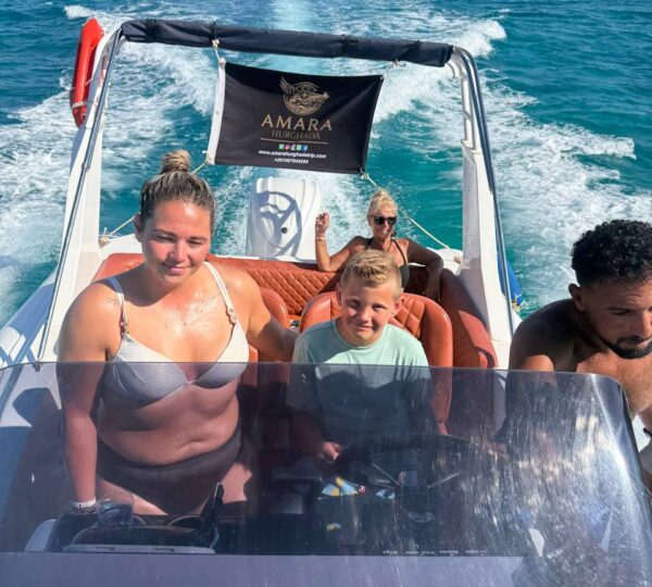 Family enjoying a private speedboat trip on the Red Sea from Hurghada