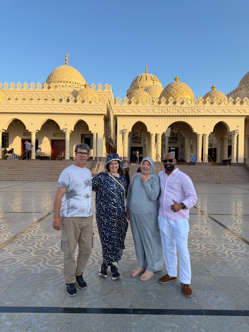 Group photo outside a mosque in Hurghada